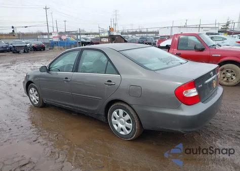 2003 Toyota Camry Le z USA, uszkodzony, nr VIN 4T1BE32K83U768702